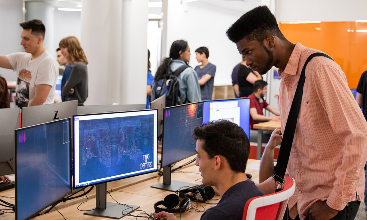 Students showing off their video game